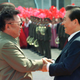 North Korean leader Kim Jong-il (L) shakes hands with South Korea's President Kim Dae-jung as the latter arrives at Pyongyang's Sunan airport June 13, 2000.